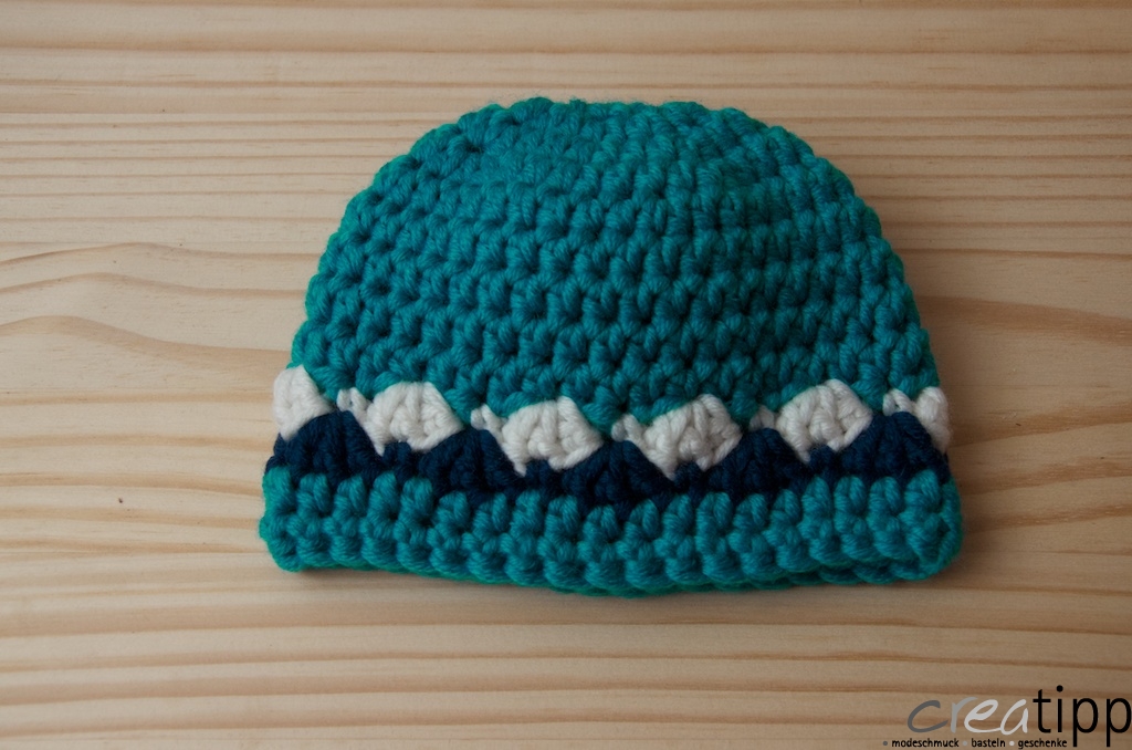 Mütze türkis mit Muschelbordüre marine-weiss